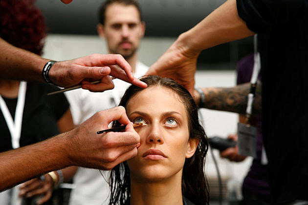 A woman getting ready with her glam squad.